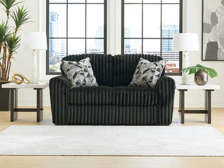 Midnight-Madness Onyx velvet loveseat angled side view