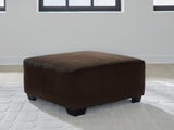 Kimlee oversized chocolate velvet accent ottoman angled view
