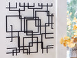 Aadanton black geometric metal wall decor front view
