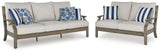 Front view of Rainier Ranch outdoor sofa and loveseat set in brown and beige