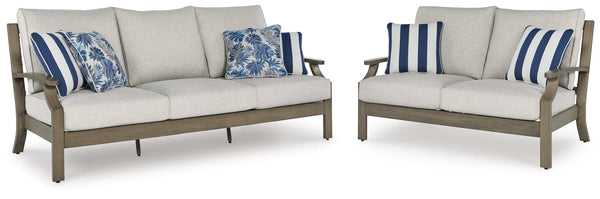 Front view of Rainier Ranch outdoor sofa and loveseat set in brown and beige