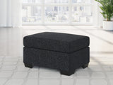 Jasmine Peaks Ottoman in coal chenille fabric, front angle