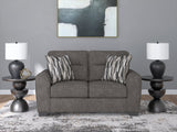 Olten Graphite Chenille Loveseat front angle view in living room