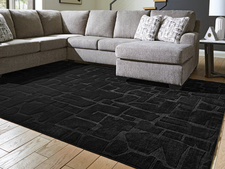 Gibbswell Black 8' x 10' washable area rug front view