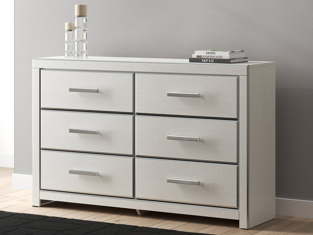 Zuraleus white dresser, front angle showing chrome-tone faceted drawer handles