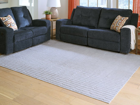 Worthley Gray washable 8x10 area rug laid flat showing subtle stripes and texture