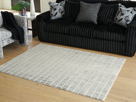 Turinwith Ivory and Black 5'3" x 7' area rug flat view