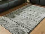 Kurtmen 5x7 black and ivory geometric area rug top view