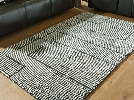 Kurtmen 5x7 black and ivory geometric area rug top view