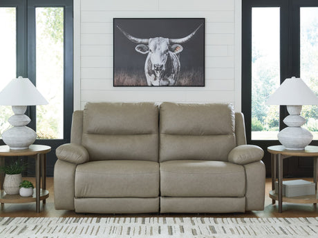Narwhal Place pebble faux leather reclining loveseat front angle