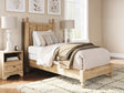 Aleaport warm brown twin panel bed angled view