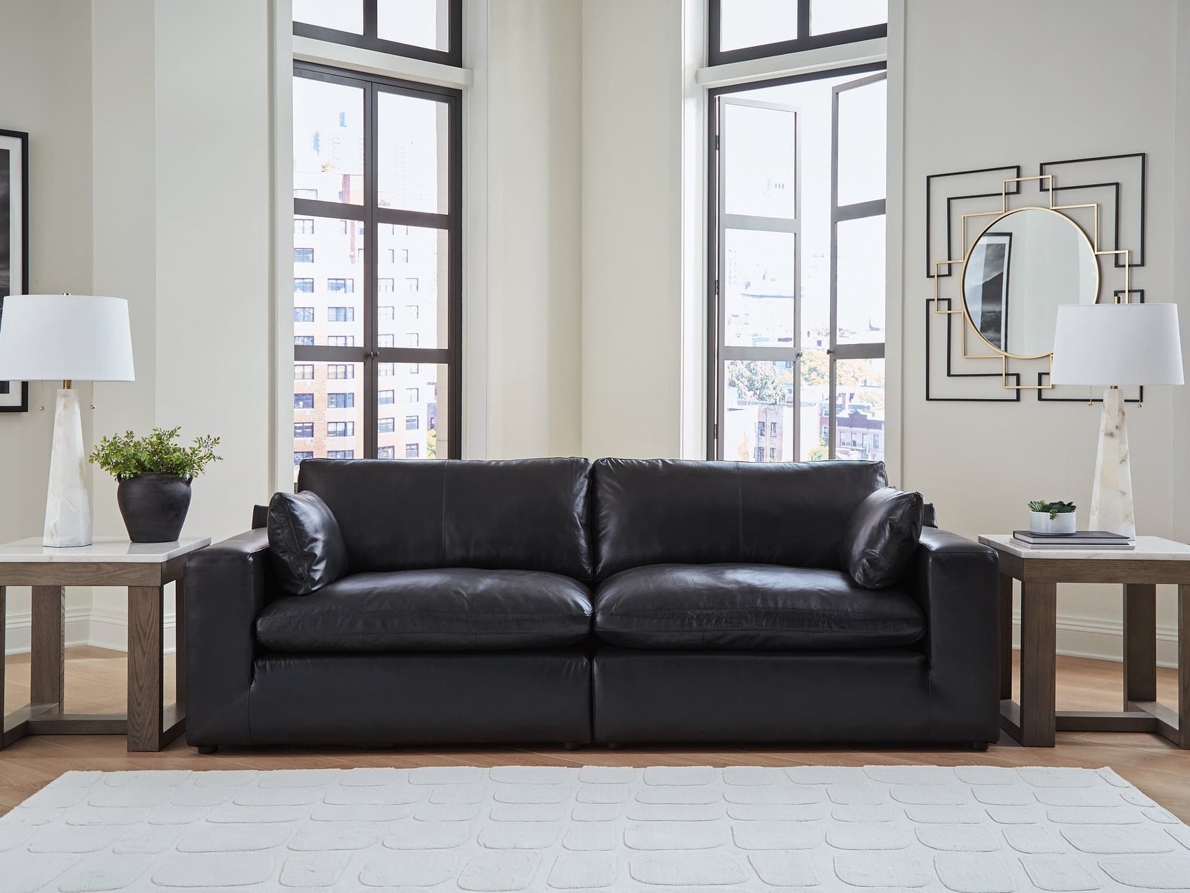 Emilia Black Leather 2-Piece Sectional Loveseat front view