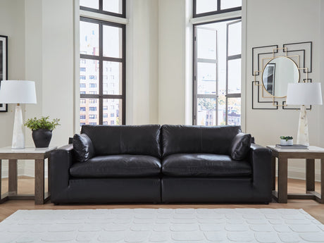 Emilia Black Leather 2-Piece Sectional Loveseat front view