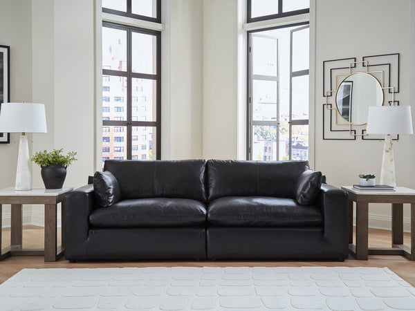 Emilia Black Leather 2-Piece Sectional Loveseat front view