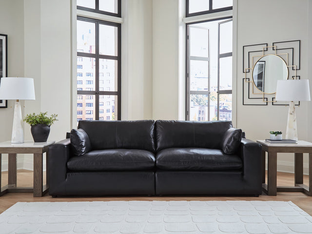 Emilia Black Leather 2-Piece Sectional Loveseat front view