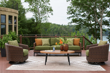 Horizon outdoor sofa with brown frame and green cushions, front angle