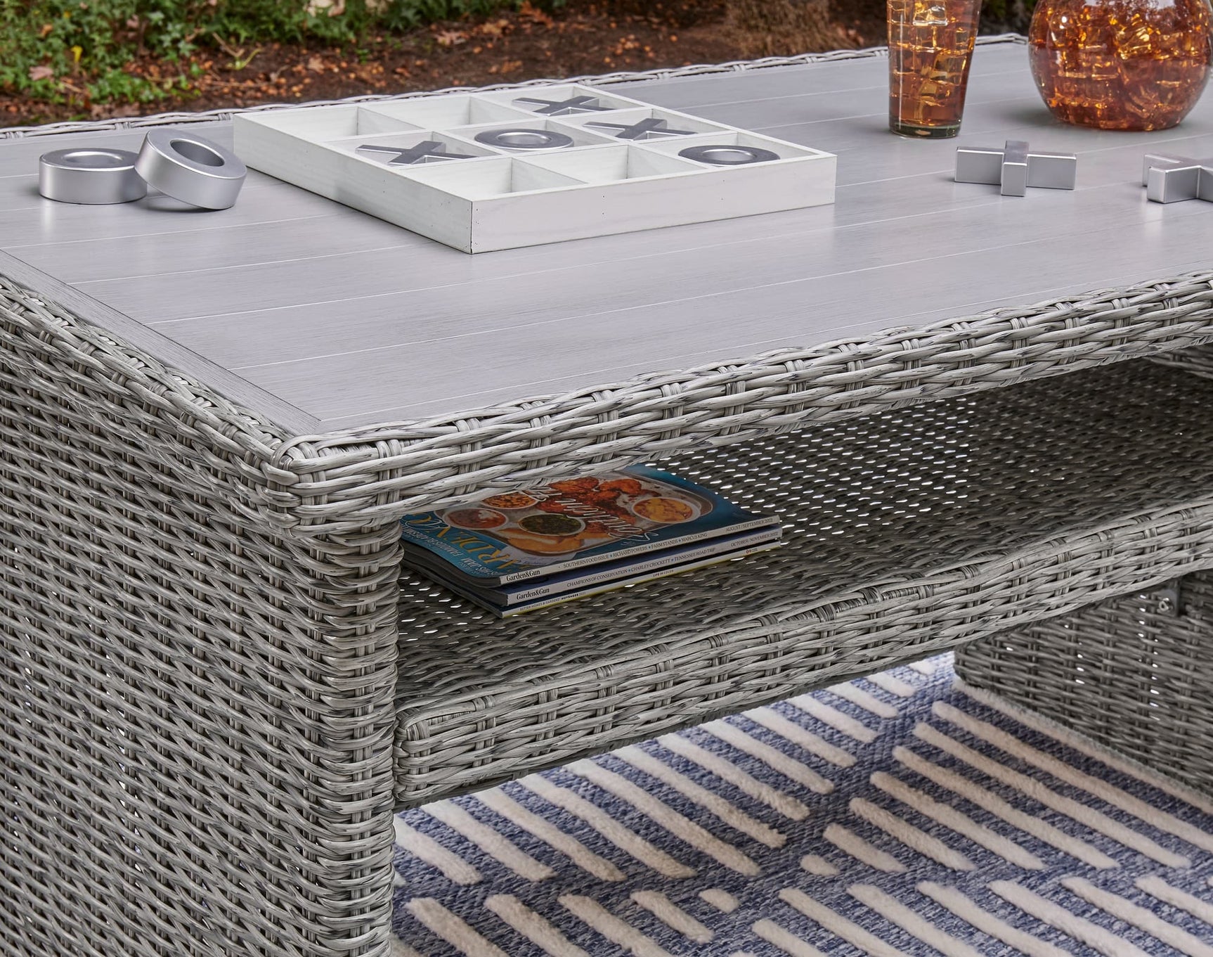 Naples light gray 2-piece outdoor sectional with multi-use table and bench, front angle