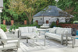 Hurley Gray Park outdoor sofa and loveseat with coffee table angled view