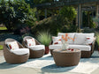 Double beige outdoor sofa set with matching loveseat and lounge chairs