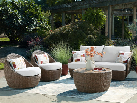 Double beige outdoor sofa set with matching loveseat and lounge chairs
