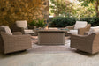 Front view of Laguna Beige Heights Outdoor Fire Pit Table with 4 beige chairs
