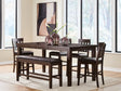 Haddigan dark brown counter height dining table with 4 barstools and bench - front view