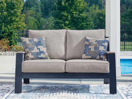 East Beach Outdoor Loveseat navy blue and driftwood finish angled view