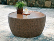 Double Point Beige Outdoor Coffee Table, front view showing woven resin wicker and hand-brushed tabletop