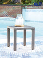 Half Moon Beach gray outdoor end table, side angled view