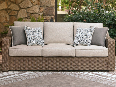 Laguna Heights beige outdoor sofa with cushions, angled front view