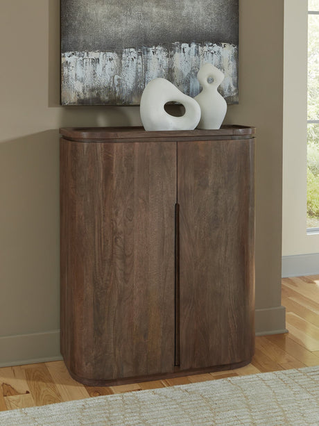 Landermont Medium Brown Bar Cabinet front angle view closed