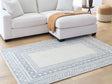 Azelhurst 5x7 area rug showing blue, ivory, and gray geometric bordered pattern