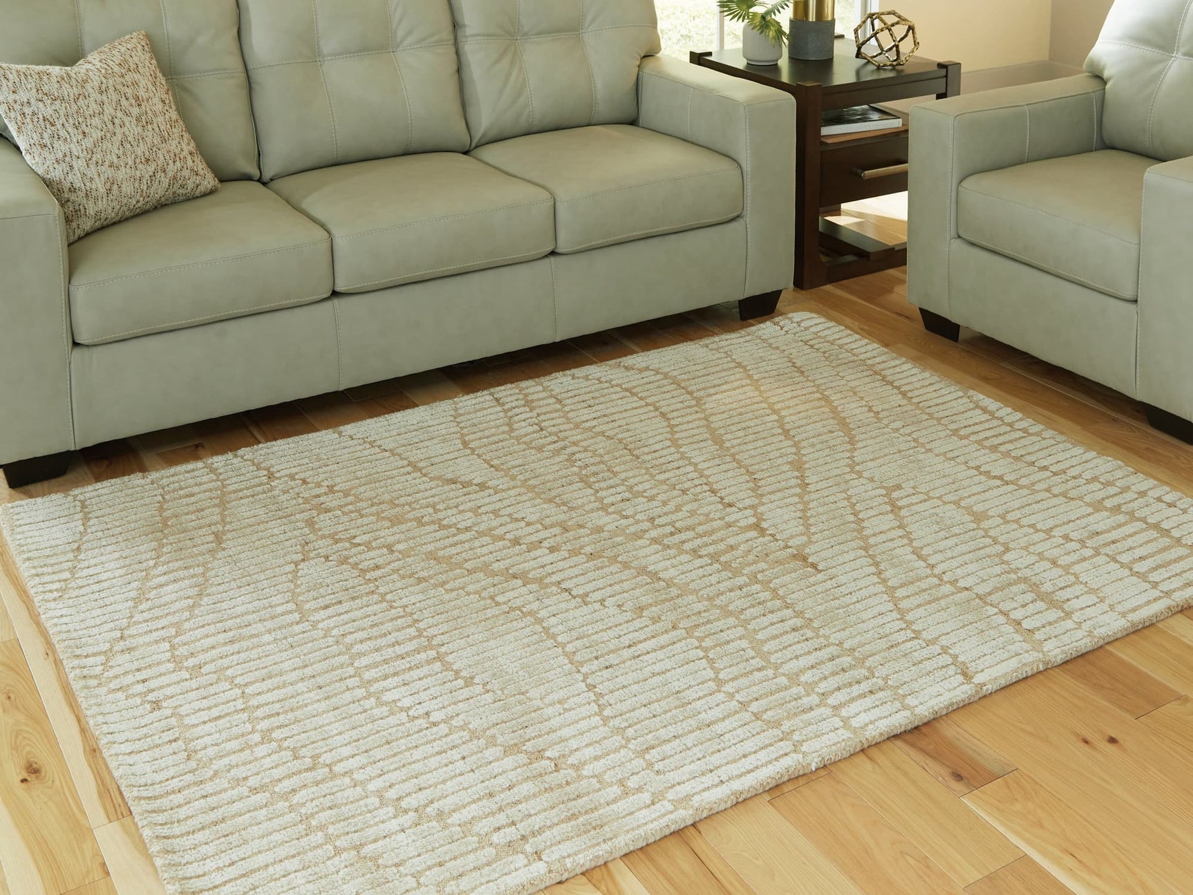 Jaseena Beige and Tan 5 by 7 area rug, front view showcasing abstract design