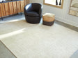 Wolbert wool area rug in tan and ivory, 7'8" x 10', view from above