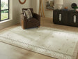 Dot area rug 7'8" x 10' with cream, brown, and taupe geometric border pattern