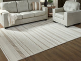Gadence Ivory and Tan 7'8 x 10 area rug laid flat