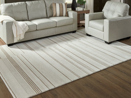 Gadence Ivory and Tan 7'8 x 10 area rug laid flat