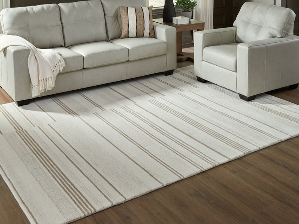 Gadence Ivory and Tan 7'8 x 10 area rug laid flat