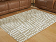 Corrbell beige and white 5 by 7 feet abstract area rug laid flat
