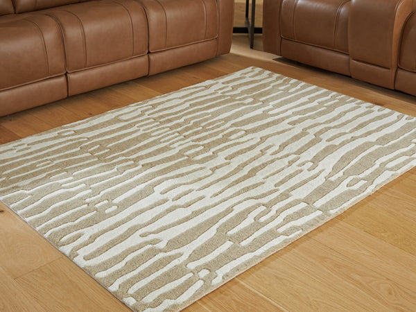 Corrbell beige and white 5 by 7 feet abstract area rug laid flat