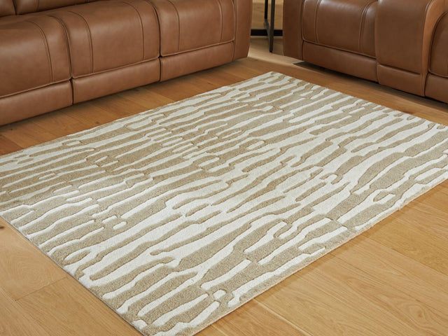 Corrbell beige and white 5 by 7 feet abstract area rug laid flat