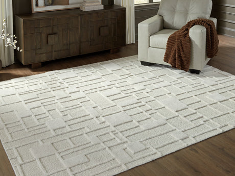Empriss Ivory 7'8" x 10' area rug front view with geometric pattern