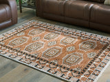 Qaabiz traditional medallion area rug in sienna, ivory, and black, full view