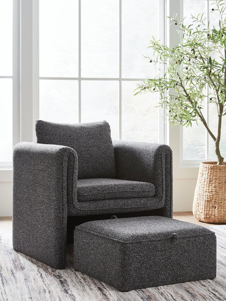 Vreni charcoal and black accent chair with ottoman front angle