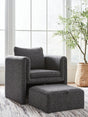 Vreni charcoal and black accent chair with ottoman front angle