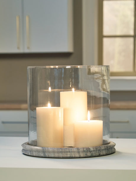 Saskia candle holder front view showing glass and marble base