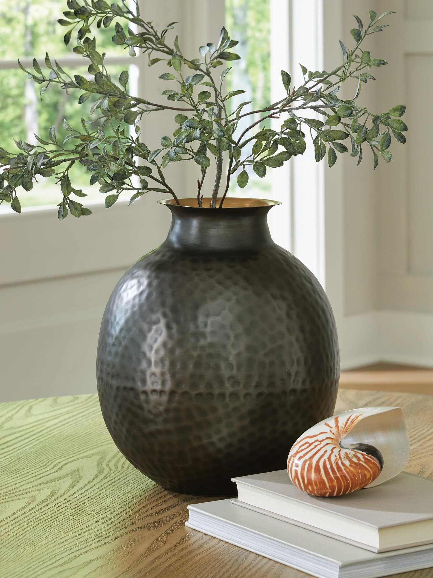 Woody hammered metal vase in pewter and gold finish, front view