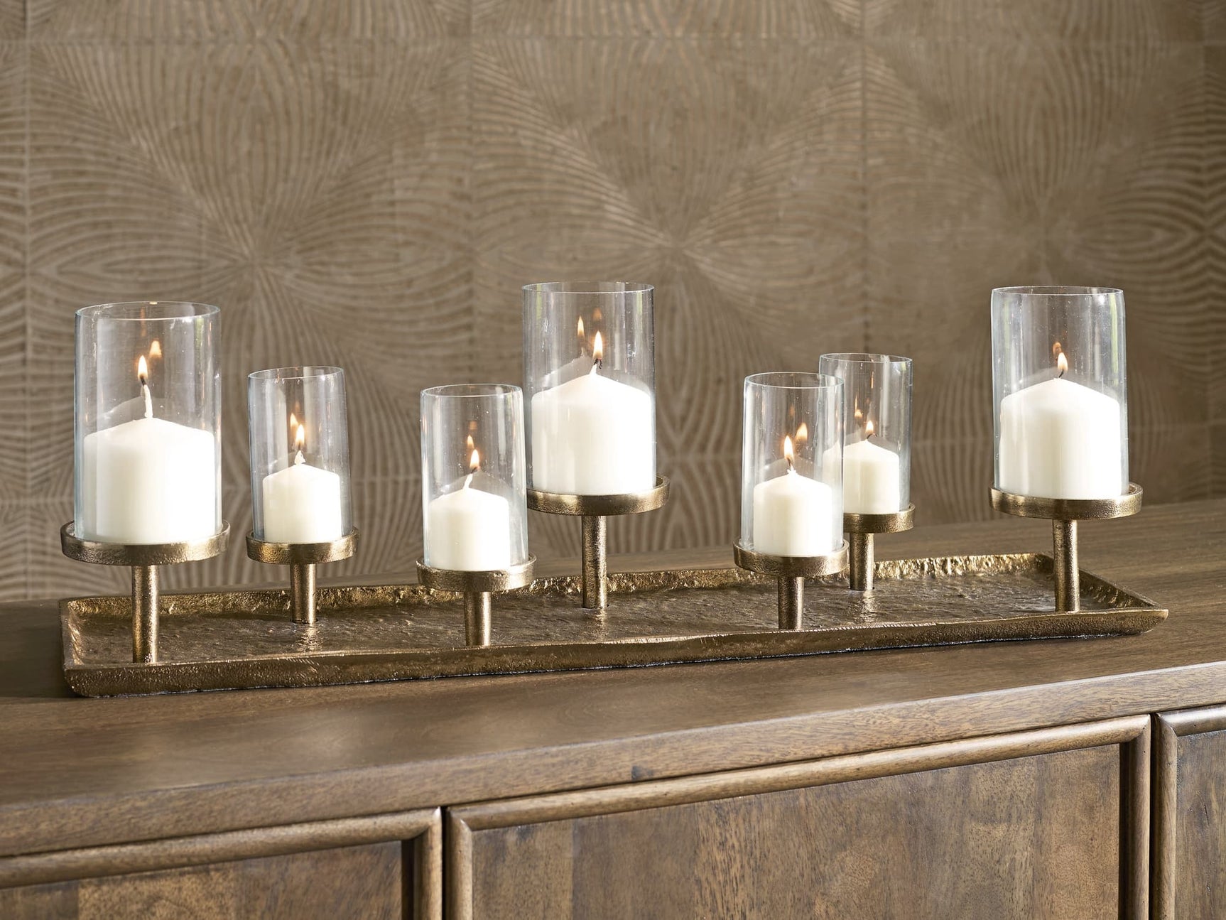 Wallmond candle holder with antique brass finish showing front view