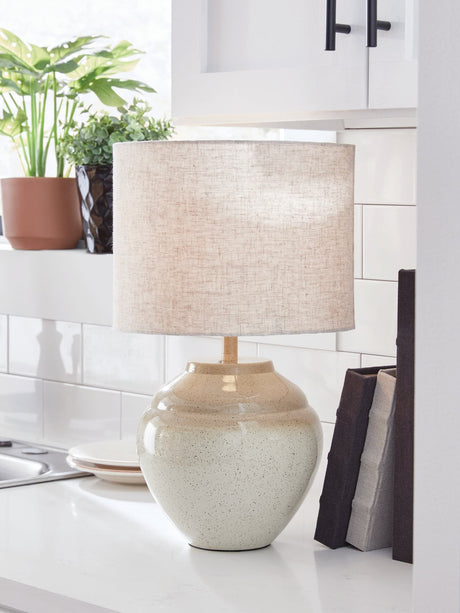 Waldish table lamp front view showing cream and beige metal base with fabric drum shade