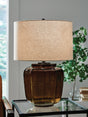 Bainmore Amber Table Lamp with amber glass base and black metal finish